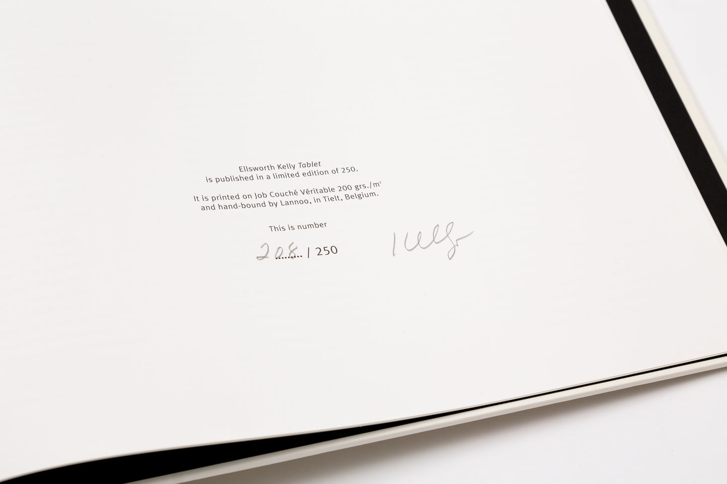 Inside pages of "TABLET" by Ellsworth Kelly, demonstrating the limited edition number as well as Kelly's signature.