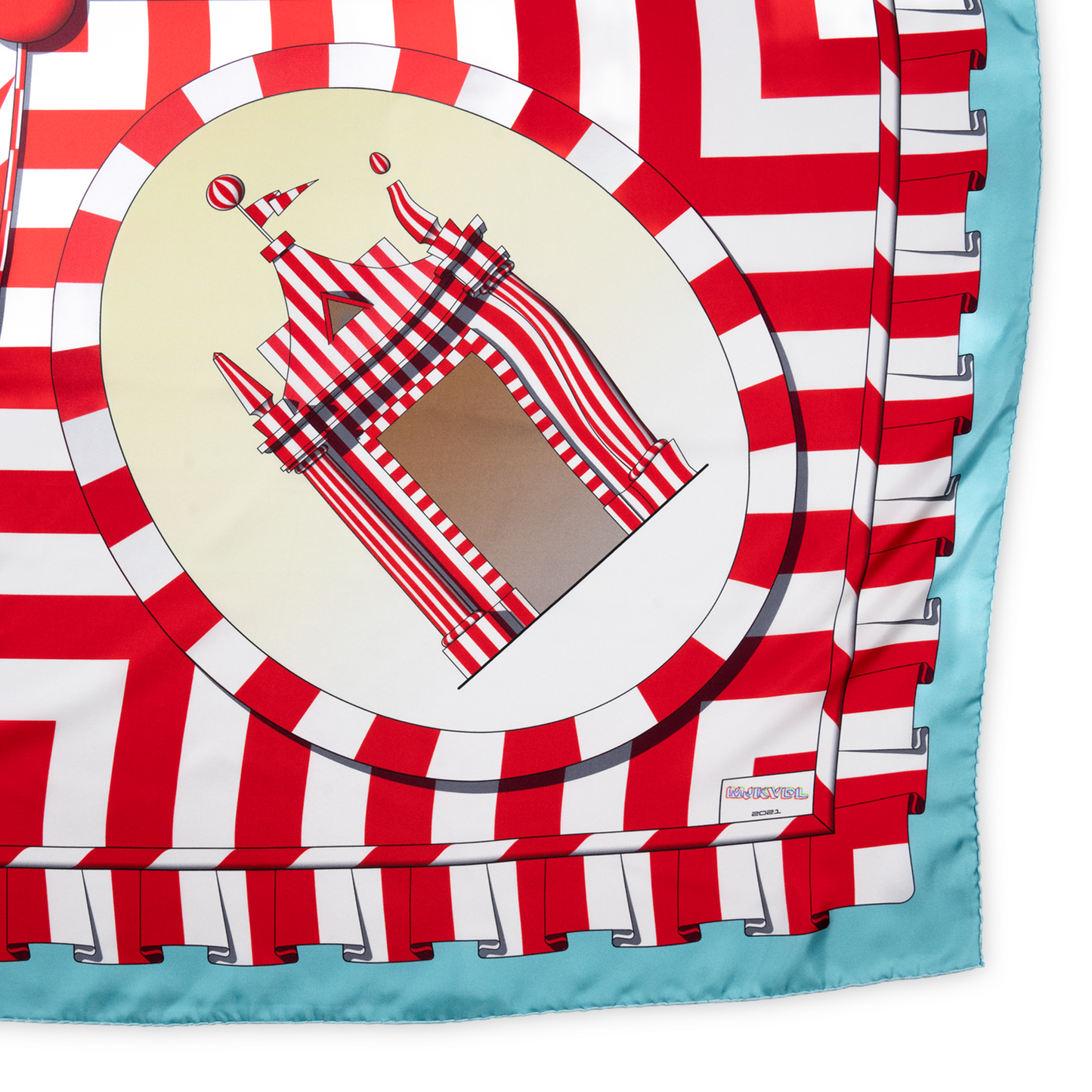A closeup of one corner of the scarf, showing detail of the tent and the pattern.