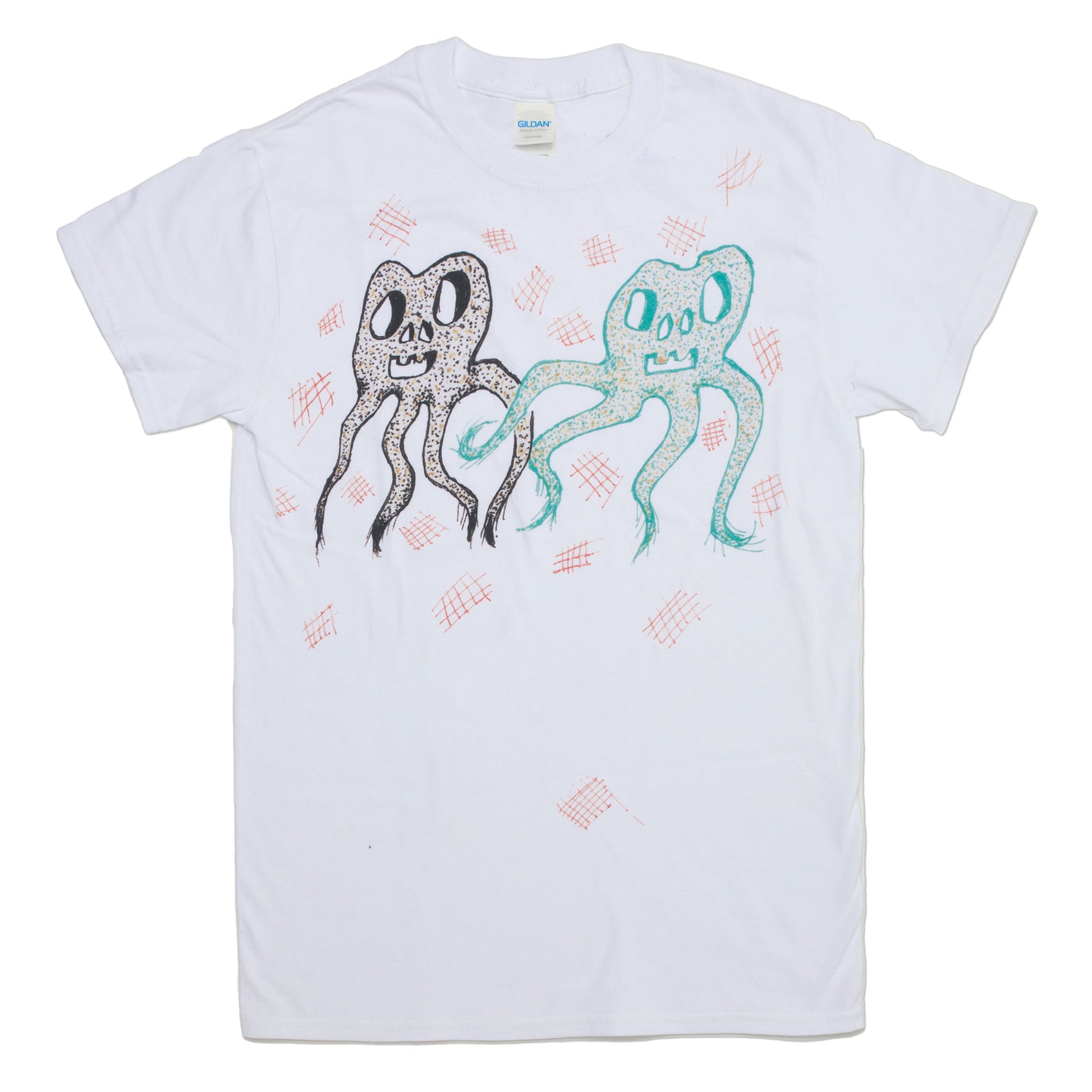General Idea t-shirt featuring a reproduction of an original t-shirt design hand drawn by Jorge Zontal of General Idea. Printed in orange, black, and green onto white fabric.