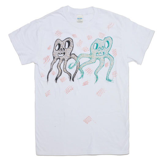 General Idea t-shirt featuring a reproduction of an original t-shirt design hand drawn by Jorge Zontal of General Idea. Printed in orange, black, and green onto white fabric.