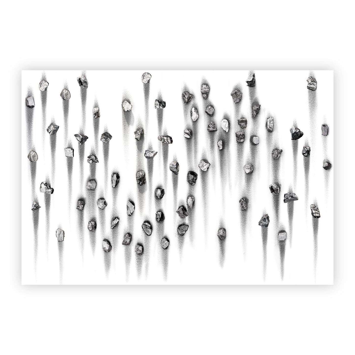 Print of "Sfumato" by Teresita Fermandez. This greyscale print features a series of rock-like forms on a white background. These forms are casting long shadows that go vertically from top to bottom.